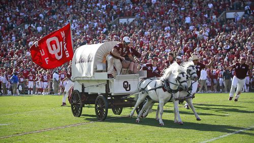 NORMAN, OK - NOVEMBER 25: The Sooner Schooner takes the field after a touchdown against the West Virginia Mountaineers at Gaylord Family Oklahoma Memorial Stadium on November 25, 2017 in Norman, Oklahoma. Oklahoma defeated West Virginia 59-31. (Photo by Brett Deering/Getty Images) *** Local Caption ***
