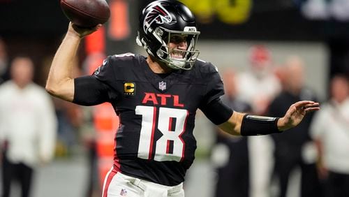 Atlanta Falcons quarterback Kirk Cousins (18) works in the pocket against the Kansas City Chiefs during the first half of an NFL football game, Sunday, Sept. 22, 2024, in Atlanta. (AP Photo/Brynn Anderson)