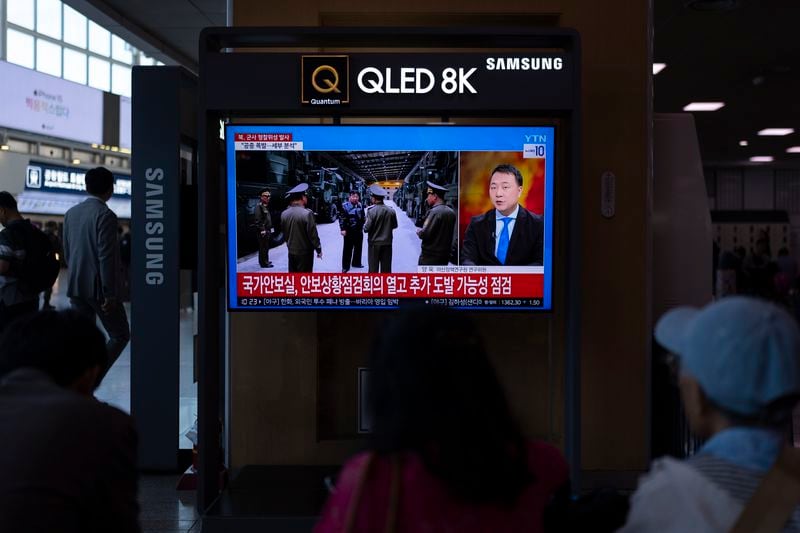 Commuters watch a news channel at Seoul Station in Seoul, Tuesday, May 28, 2024, showing North Korean leader Kim Jong Un after a rocket launched by North Korea to deploy a spy satellite exploded shortly after launch the previous day. (AP Photo/Jae C. Hong)