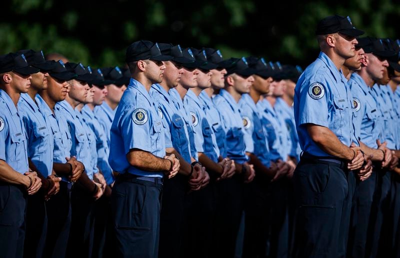 Massachusetts State Police Command Staff and over 180 recruits from the 90th Recruit Training Troop stand in formation outside Mercadante Funeral Home & Chapel in Worcester, Mass, Friday, Sept. 27, 2024, for police recruit Enrique Delgado-Garcia, who died during a boxing training exercise. (Erin Clark/The Boston Globe via AP)