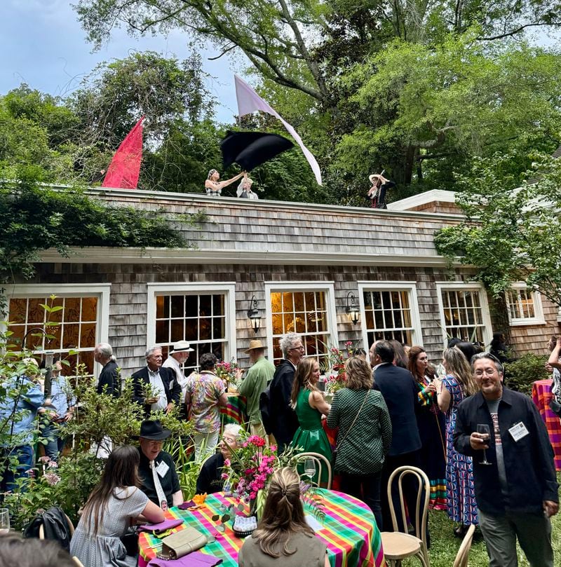 Beacon Dance performers took to the rooftop with flags and music while performing at Paradise Garden's Atlanta Patron Party in June. Courtesy of Paradise Garden Foundation