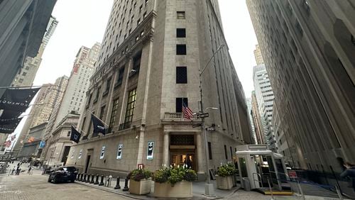 FILE - The entrance to the New York Stock Exchange at Wall and New Streets is shown on Oct. 2, 2024, in New York. (AP Photo/Peter Morgan, File)