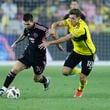 Inter Miami's Lionel Messi, left, and Columbus Crew's Malte Amundsen chase the ball during the second half of an MLS soccer match, Wednesday, Oct. 2, 2024, in Columbus, Ohio. (AP Photo/Jay LaPrete)