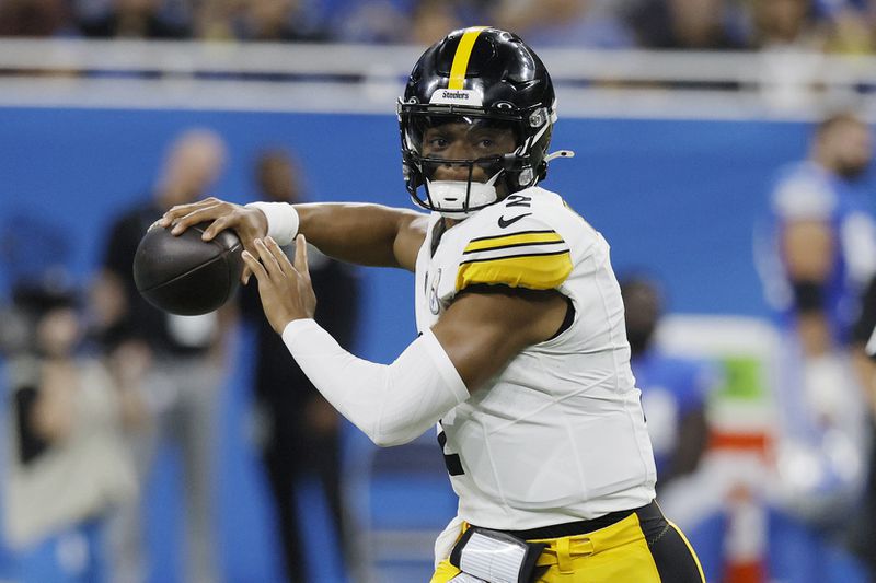 Pittsburgh Steelers quarterback Justin Fields scrambles during the first half of an NFL preseason football game against the Detroit Lions, Saturday, Aug. 24, 2024, in Detroit. (AP Photo/Duane Burleson)