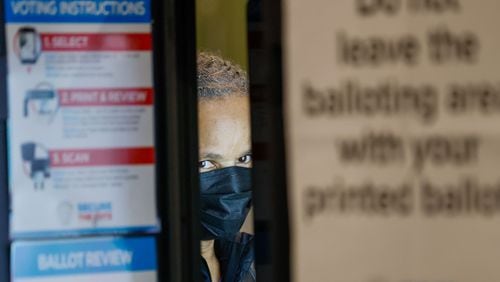 Chandra Brown is seen casting her ballot at the Joan P. Garner Library at Ponce De Leon during the Georgia presidential primary elections on Tuesday, March 12, 2024.
Miguel Martinez /miguel.martinezjimenez@ajc.com