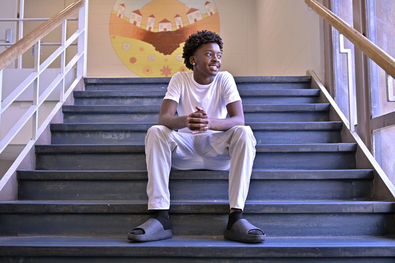 Flerentin “Flex” Jean-Baptiste, 16, of Medford, Mass., poses for a photo at Medford High School, Friday, Aug. 2, 2024, in Medford. (AP Photo/Josh Reynolds)