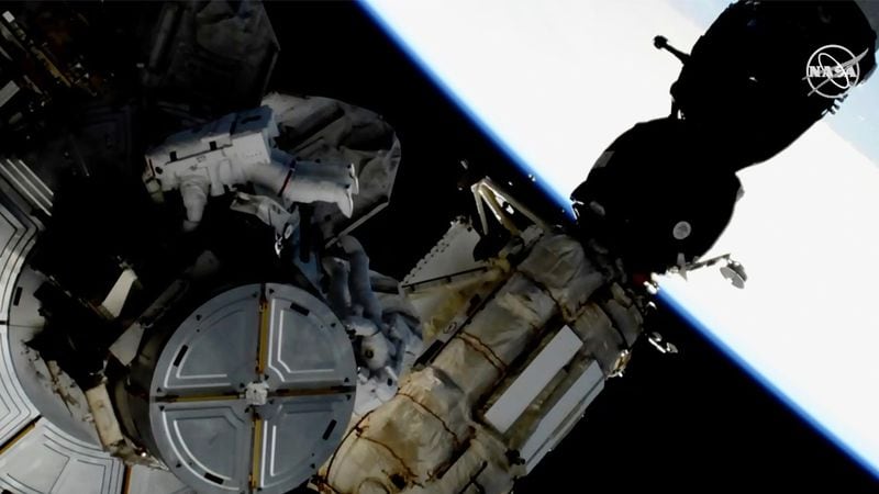 This image provided by NASA shows astronauts Anne McClain and Nick Hague taking a spacewalk to replace aging batteries on the International Space Station on Friday, March 22, 2019. The spacewalk was the first of three planned excursions to replace batteries and perform other maintenance.