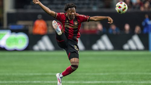 Atlanta United midfielder Jay Fortune passes the ball during the first half of an MLS soccer match against Toronto FC, Saturday, June 29, 2024, in Atlanta. (AP Photo/Danny Karnik)