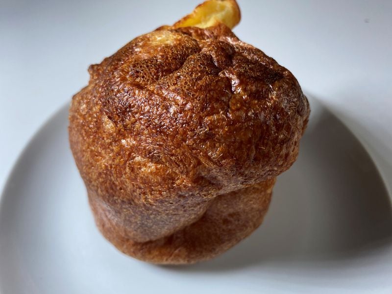 King + Duke's popovers with cheddar cheese are a favorite starter. Bob Townsend for The AJC