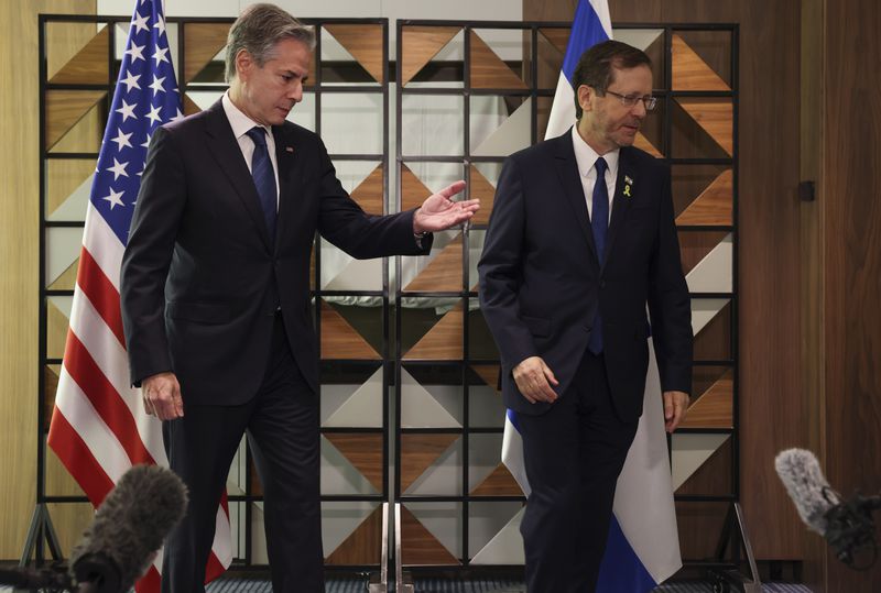 U.S. Secretary of State Blinken, left, meets with Israel's President Isaac Herzog, in Tel Aviv, Israel, Monday, Aug. 19, 2024. (Kevin Mohatt/Pool/Pool Photo via AP)