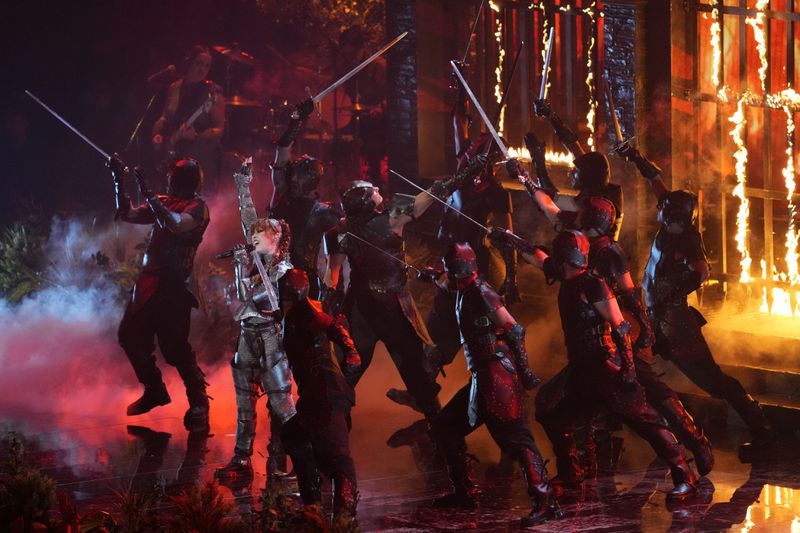 Chappell Roan, center, performs "Good Luck, Babe" during the MTV Video Music Awards on Wednesday, Sept. 11, 2024, at UBS Arena in Elmont, N.Y. (Photo by Charles Sykes/Invision/AP)