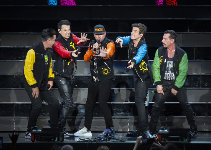 New Kids on the Block cranked out the hits to a packed house of neon clad fans at Ameris Bank Amphitheatre in Alpharetta on Friday, July 26, 2024. (RYAN FLEISHER FOR THE ATLANTA JOURNAL-CONSTITUTION)