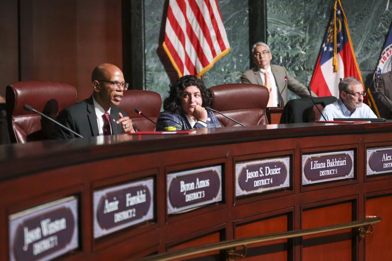 Council member Jason Dozier, left, speaks next to Council member Liliana Bakhtiari on Tuesday, June 6, 2023, in Atlanta. (Jason Getz / Jason.Getz@ajc.com)