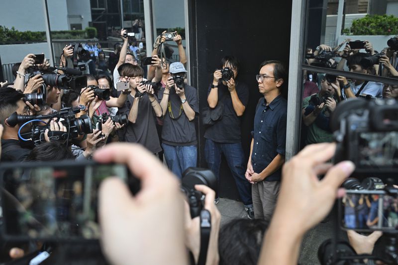 Chung Pui-kuen, the former chief editor of Hong Kong's now-shuttered outlet Stand News, walks outside on bail after he was found guilty in a landmark sedition trial under a colonial-era law, in Wanchai District Court in Hong Kong on Thursday, Aug. 29, 2024. (AP Photo/Billy H.C. Kwok)