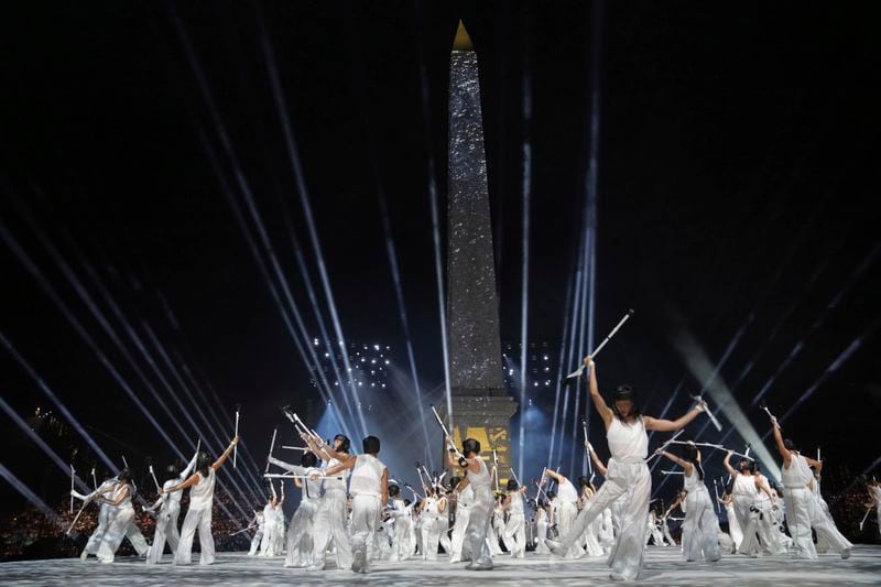 Artists perform during the Opening Ceremony for the 2024 Paralympics, Wednesday, Aug. 28, 2024, at La Concorde square in Paris, France. (AP Photo/Thibault Camus, Pool)