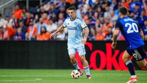 Atlanta United's Bartosz Slisz looks to pass during the first half of Wednesday's MLS match at TQL Stadium in Cincinnati, Ohio.