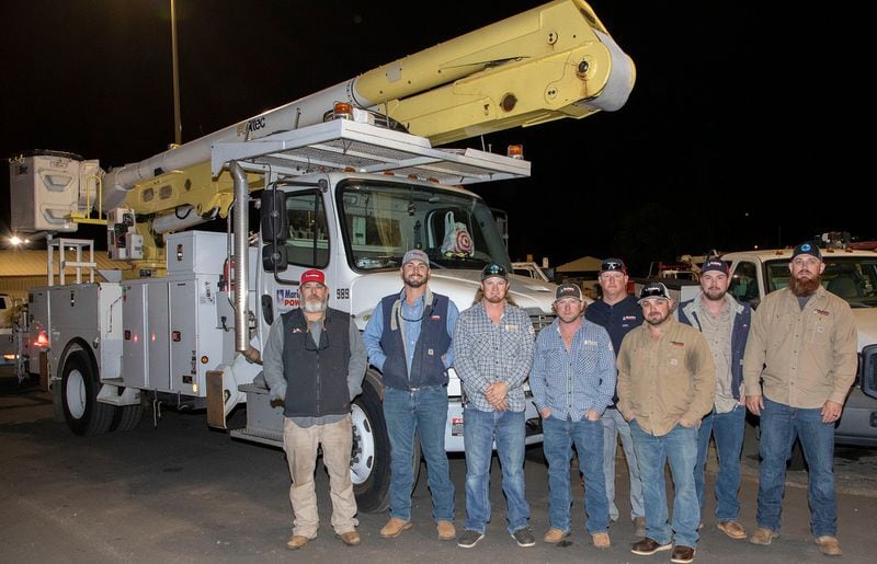 A crew from Marietta Power left for South Carolina to assist following Hurricane Ian. From left, linemen Jeremy Bassett, Adam Cochran, Cody Toler and Taylor Bagley, foreman Trinity Broome, Darrell Jackson and apprentice linemen Garrett Griffith and Spencer Reynolds. Photo credit: City of Marietta