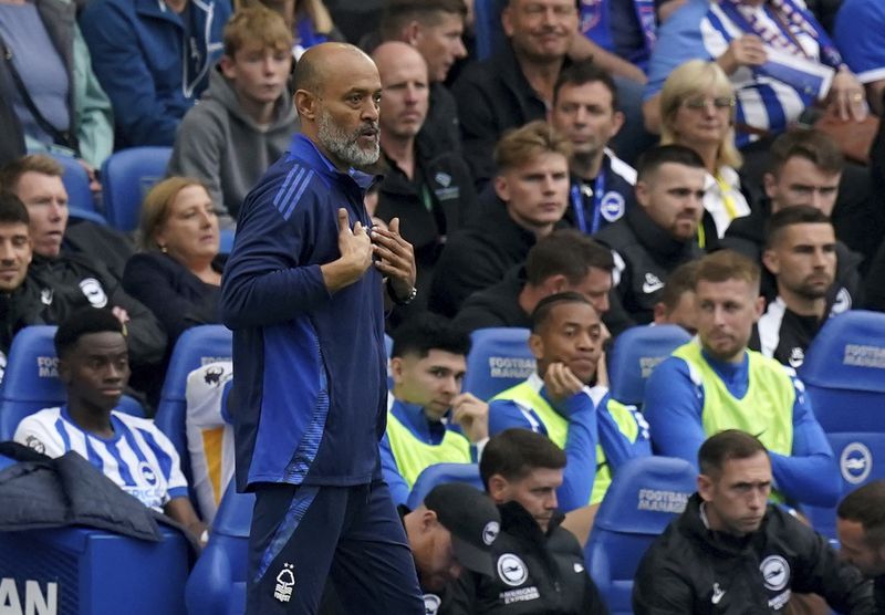 Nottingham Forest manager Nuno Espirito Santo gestures, during the English Premier League soccer match between Brighton and Nottingham Forest, at the American Express Stadium, in Brighton and Hove, England, Sunday, Sept. 22, 2024. (Gareth Fuller/PA via AP)