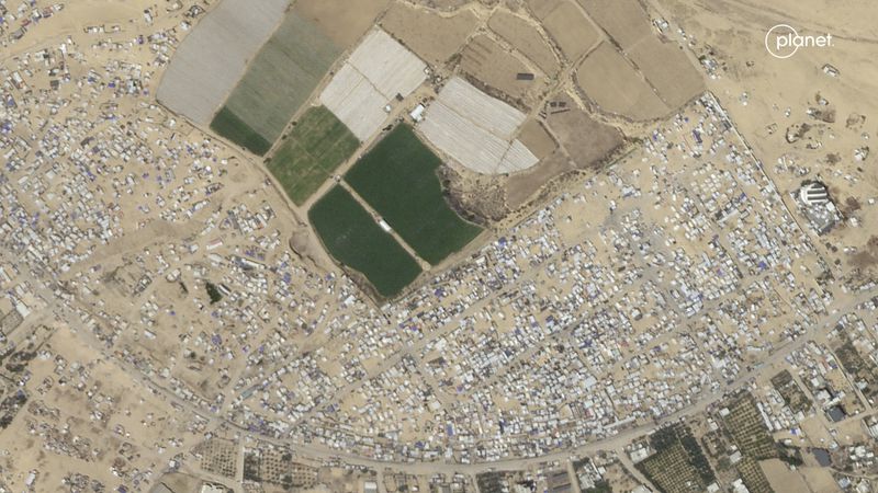 This satellite photo taken by Planet Labs PBC shows an camp before its mass evacuation in Rafah, Gaza, May 5, 2024. (Planet Labs PBC via AP)