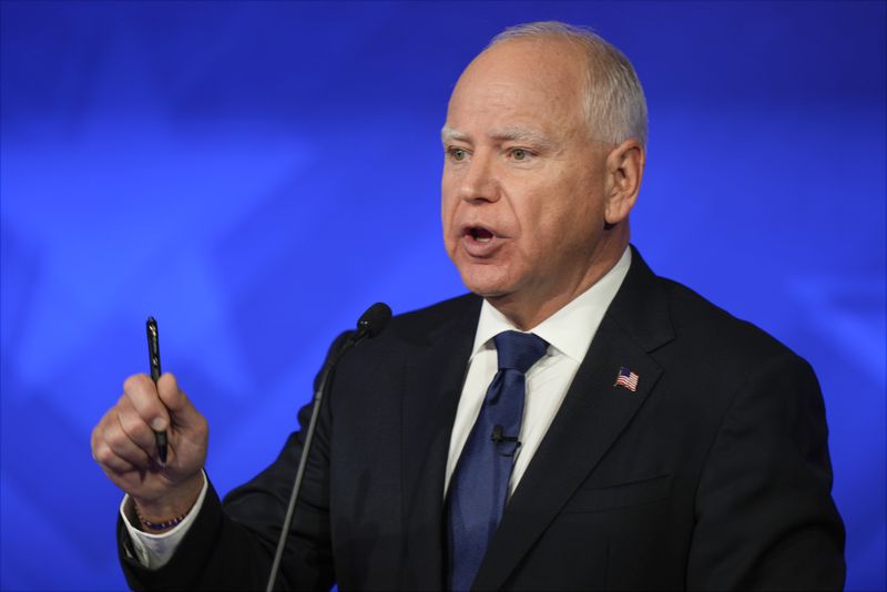 Democratic vice presidential nominee Minnesota Gov. Tim Walz speaks during a vice presidential debate hosted by CBS News, with Republican vice presidential nominee Sen. JD Vance, R-Ohio, Tuesday, Oct. 1, 2024, in New York. (AP Photo/Matt Rourke)