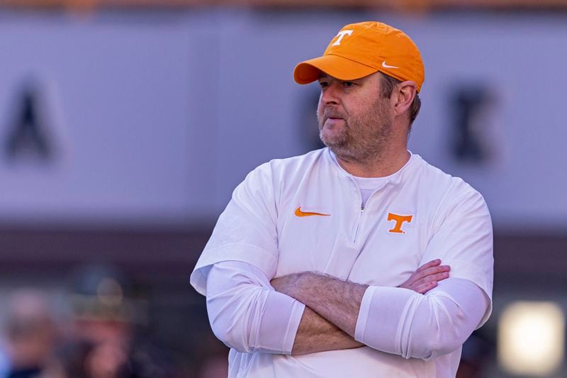 FILE - Tennessee head coach Josh Heupel watches his players warm up before an NCAA college football game against Georgia, Saturday, Nov. 18, 2023, in Knoxville, Tenn. (AP Photo/Wade Payne, File)