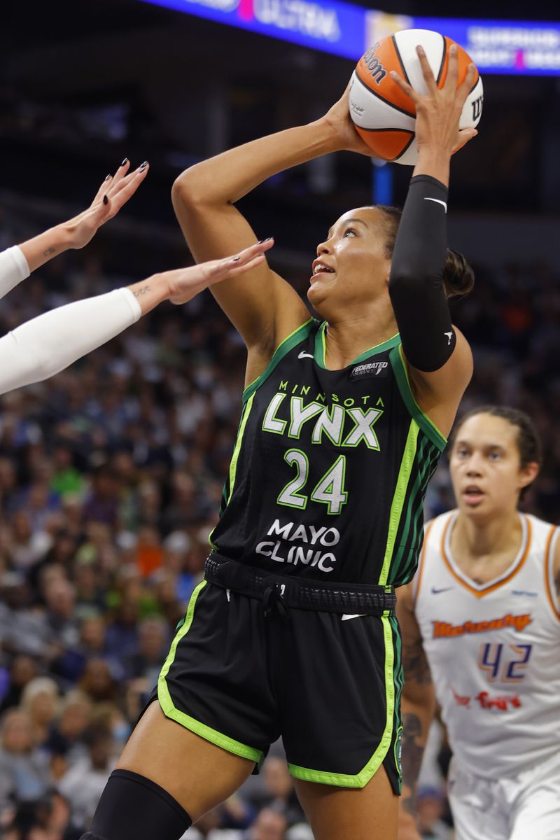 Minnesota Lynx forward Napheesa Collier (24) shoots against the Phoenix Mercury in the first quarter of Game 2 of a WNBA basketball first-round playoff game, Wednesday, Sept. 25, 2024, in Minneapolis. (AP Photo/Bruce Kluckhohn)