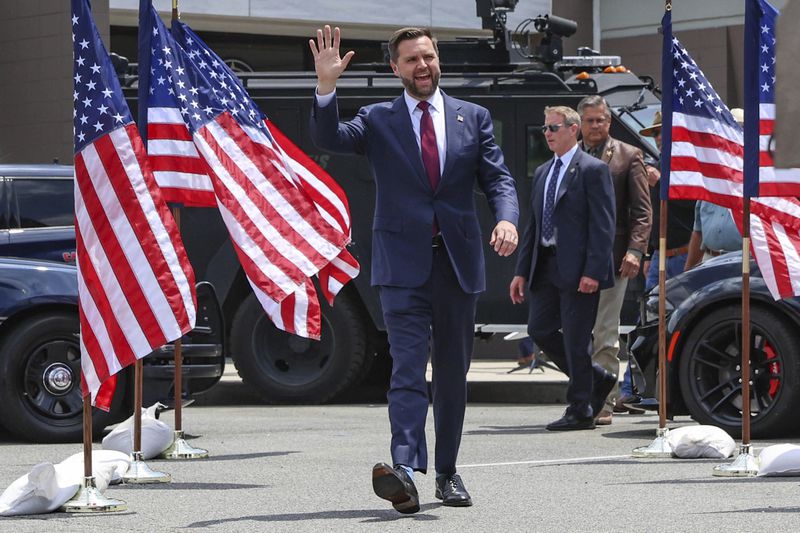 Republican vice presidential nominee Sen. JD Vance, R-Ohio, arrives to speak at a campaign rally at the Lowndes County Sheriff's Office, Thursday, Aug. 22, 2024, in Valdosta, Ga. (AP Photo/Gary McCullough)