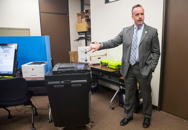 09/16/2019 -- Atlanta, Georgia -- Chris Harvey, director of elections division for the Georgia Secretary of State, shows off the new Georgia voting machines during a demonstration at the James H. "Sloppy" Floyd building in Atlanta, Monday, September 16, 2019. (Alyssa Pointer/alyssa.pointer@ajc.com)