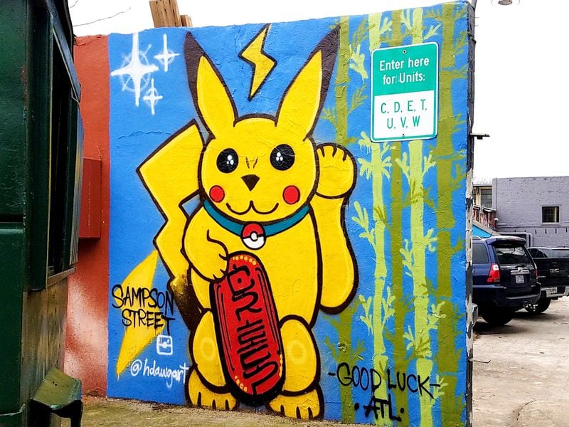 Pikachu, we hardly knew you! H Dawg painted the Pokémon character  in the form of a Japanese Maneki-Neko cat in a mural at the entrance to Sampson Lofts on John Wesley Dobbs Avenue. Courtesy of Arthur Rudick