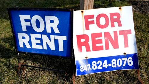 FILE - Signs advertising housing for rent are displayed in Glenview, Ill., on Jan. 29, 2024. (AP Photo/Nam Y. Huh, File)
