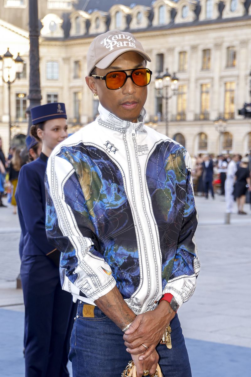 Pharrell Williams poses for photographers upon arrival at the Vogue World event on Sunday, June 23, 2024 in Paris. (Photo by Vianney Le Caer/Invision/AP)