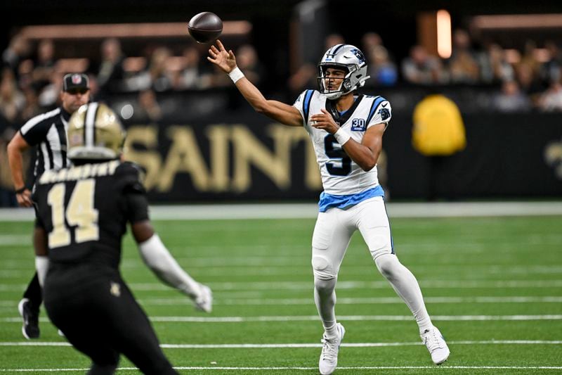 Carolina Panthers quarterback Bryce Young (9) throws a pass during the second half of an NFL football game against the New Orleans Saints, Sunday, Sept. 8, 2024, in New Orleans. (AP Photo/Matthew Hinton)