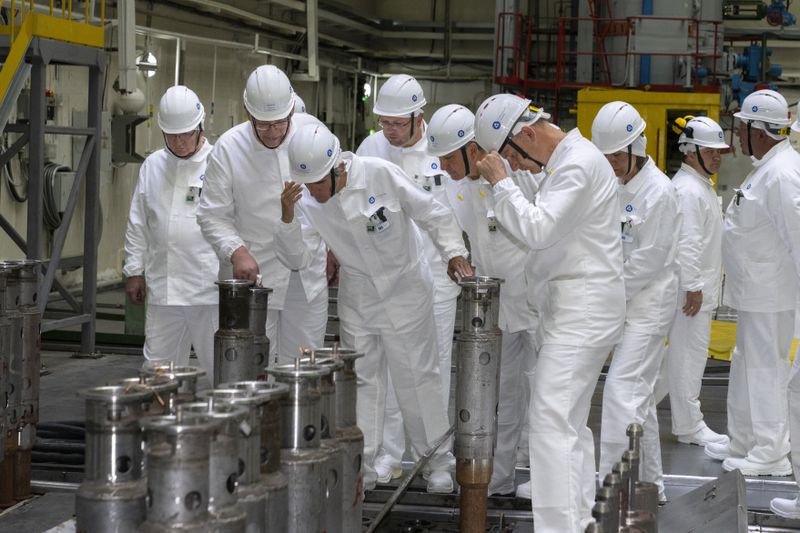 In this photo released by Rosatom State Atomic Energy Corporation, International Atomic Energy Agency chief Rafael Grossi, third left, visits the Kursk Nuclear Power Plant (KNPP) outside the town of Kurchatov, in the Kursk Region, Russia, on Tuesday, Aug. 27, 2024. (Rosatom State Atomic Energy Corporation via AP)