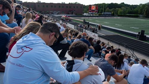 Hundreds gather Sunday at Flowery Branch High School  to celebrate the life of Ricky Aspinwall II. Aspinwall was one of the four people killed during the mass shootings at Apalachee High School in Barrow County. (Ben Hendren for The Atlanta Journal-Constitution)