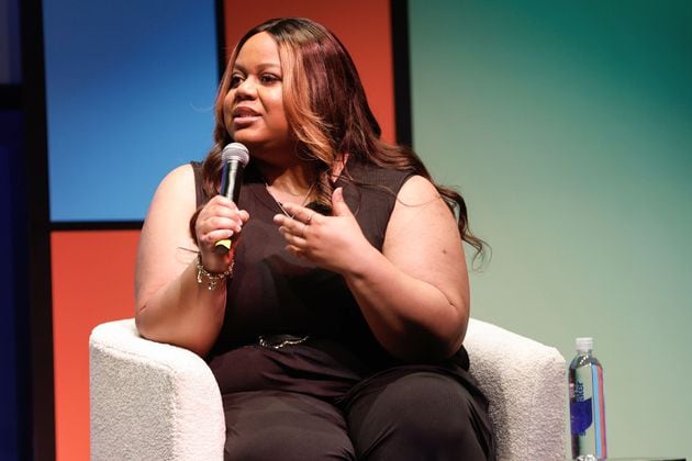 Internet personality Tareasa Johnson, known online as Reesa Teesa, speaks to media personality Anisa Brenee on a panel about storytelling during CultureCon on the campus of Clark Atlanta University on Friday, April 12, 2024. Johnson went viral after creating the 50-part TikTok series “Who TF Did I Marry?” where she talks about her six-month marriage to a man that she says was a pathological liar. (Natrice Miller/ AJC)