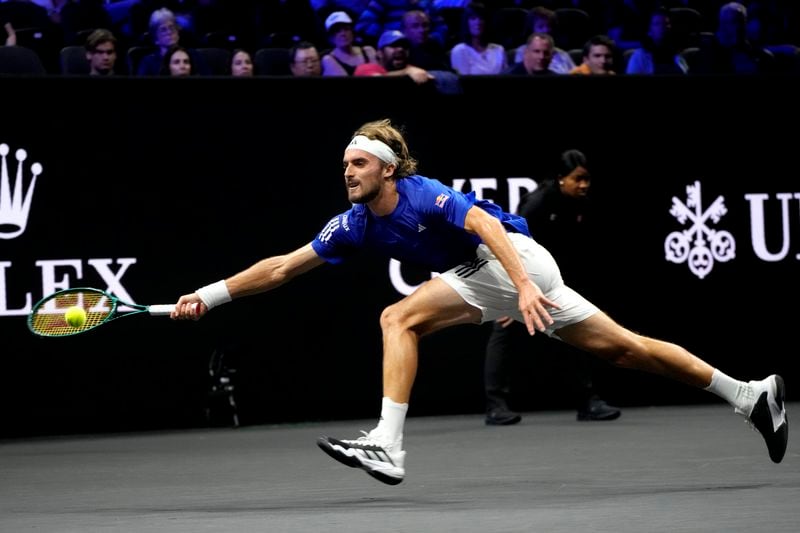 Team Europe's Stefanos Tsitsipas returns a ball during his singles tennis match against team World's Thanasi Kokkinakis on the first day of the Laver Cup tennis tournament at the Uber arena in Berlin, Germany, Friday, Sept. 20, 2024. (AP Photo/Ebrahim Noroozi)