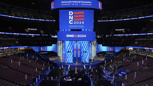 Workers prepare the convention floor at United Center before the Democratic National Convention Sunday, Aug. 18, 2024, in Chicago. (AP Photo/Paul Sancya)