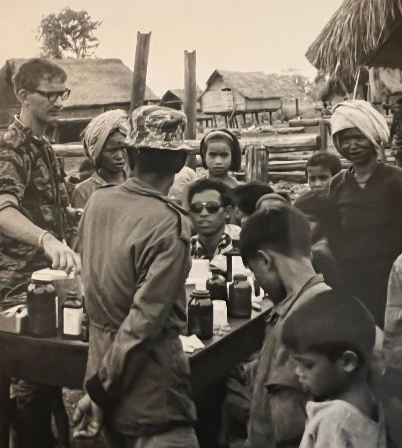 Bryant Schroeder, far left, was sent to a camp in Vietnam’s Central Highlands, about 12 miles from the Cambodian border. In addition to caring for fellow U.S. troops, he treated the Vietnamese civilians they encountered. Whole villages lined up to see him. Schroeder treated some of the villagers for illnesses and shrapnel wounds. For others, he pulled teeth. He also delivered babies.