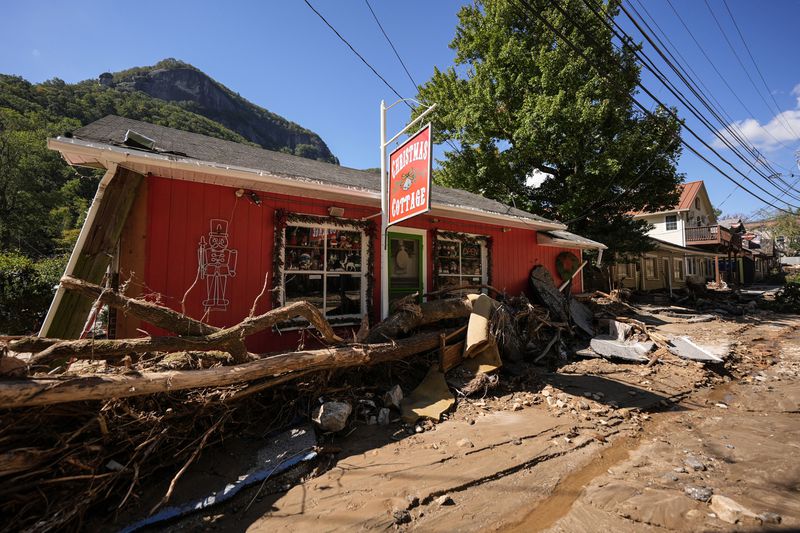 Business are seen in a debris field in the aftermath of Hurricane Helene, Wednesday, Oct. 2, 2024, in Chimney Rock Village, N.C. (AP Photo/Mike Stewart)