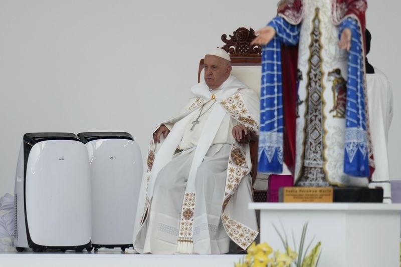 Pope Francis leads the holy mass at Gelora Bung Karno Stadium in Jakarta, Indonesia, Thursday, Sept. 5, 2024. (AP Photo/Achmad Ibrahim, Pool)