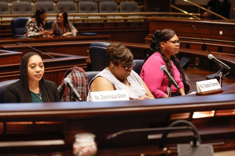 From left to right, Dominique Grant, Tabatha Trammell and Tiana Hall wait to testify during a hearing that is a part of Sen. Jon Ossoff’s ongoing investigation into the abuse of pregnant women in state prisons and jails on Wednesday, Aug. 14, 2024. (Natrice Miller/ AJC) 