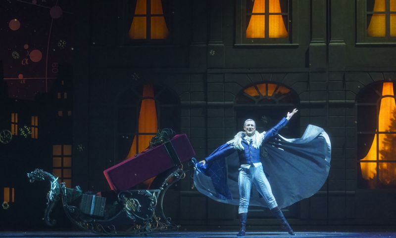 Jacob Bush gives a grand flourish in his role as Drosselmeier in Atlanta Ballet's "The Nutcracker."