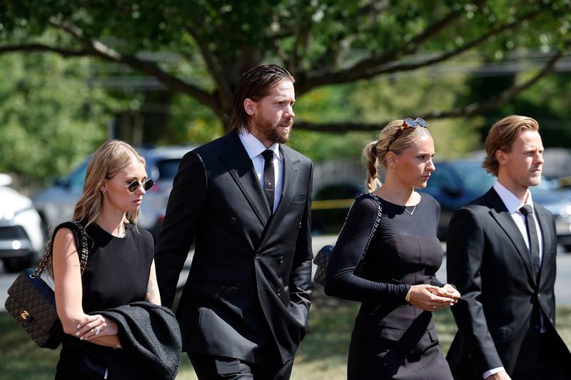 New Jersey Devils goaltender Jacob Markström, second left, arrives for the funeral services for Columbus Blue Jackets hockey player John Gaudreau and Matthew Gaudreau at Saint Mary Magdalen Church in Media, Pa., Monday, Sept. 9, 2024. (Yong Kim/The Philadelphia Inquirer via AP)