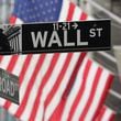 FILE - Signs marking the intersection of Broad and Walls Streets appear near the New York Stock Exchange on Oct. 1, 2024, in New York. (AP Photo/Peter Morgan, File)