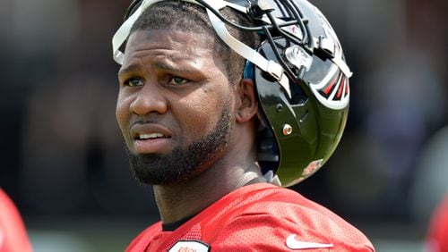 Atlanta Falcons wide receiver Devin Hester takes a break during training camp on Friday, July 25, 2014.