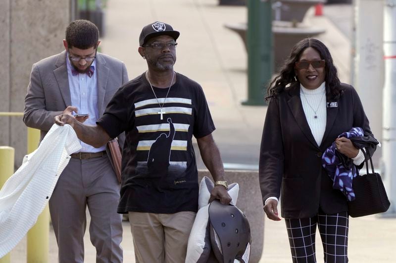 Tyre Nichols mother RowVaughn Wells, second from right, arrives at the federal courthouse for the day's proceedings on Tuesday, Oct. 1, 2024, in Memphis, Tenn. (AP Photo/Karen Pulfer Focht)