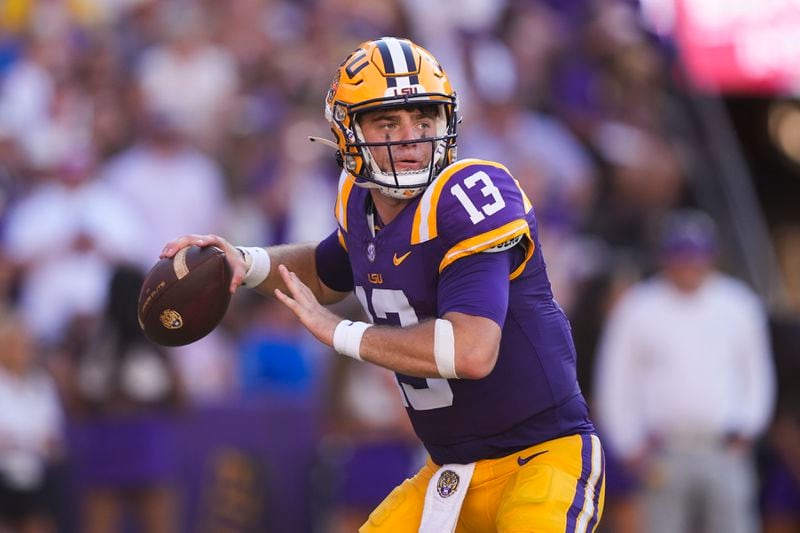 LSU quarterback Garrett Nussmeier (13) drops back to pass in the second half of an NCAA college football game against UCLA in Baton Rouge, La., Saturday, Sept. 21, 2024. LSU won 34-17. (AP Photo/Gerald Herbert)