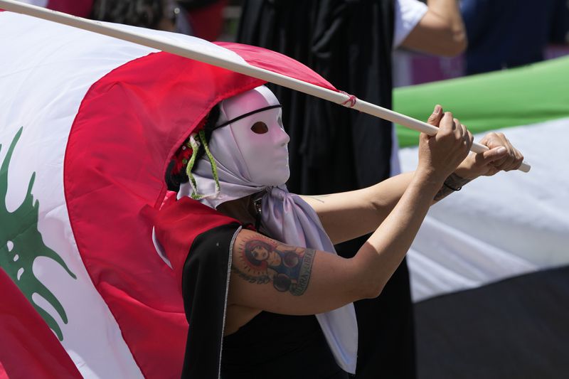 Pro-Palestinian protesters demonstrate in Quito, Ecuador, Saturday, Oct. 5, 2024. (AP Photo/Dolores Ochoa)