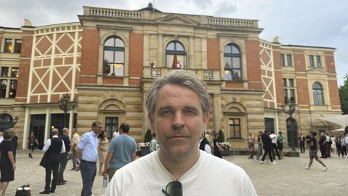 This August 2024 photo shows director Thorleifur Örn Arnarsson outside the Bayreuth Festpielhaus in Bayreuth, Germany during rehearsals for his production of Wagner’s “Tristan und Isolde.” (Thorleifur Örn Arnasson via AP)