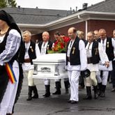 Mourners carry the casket of Ana Cristina Irimie, a math teacher killed at Apalachee High School during a school shooting, after her funeral service at Hamilton Mill Memorial Chapel and Gardens in Buford on Saturday, September 14, 2024. (Arvin Temkar / AJC)